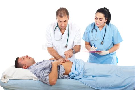 Doctor Examine Patient In Hospital Bed Stock Photo Image 16950444