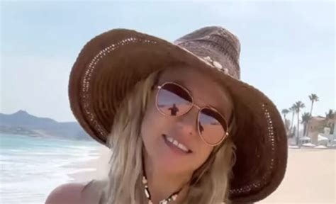 Britney Spears Goes Topless In Yellow Bikini On The Beach