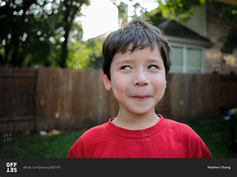 Young Boy Making Silly Expression Stock Photo Offset