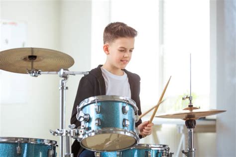 Little Boy Playing Drums Stock Photos Pictures And Royalty Free Images