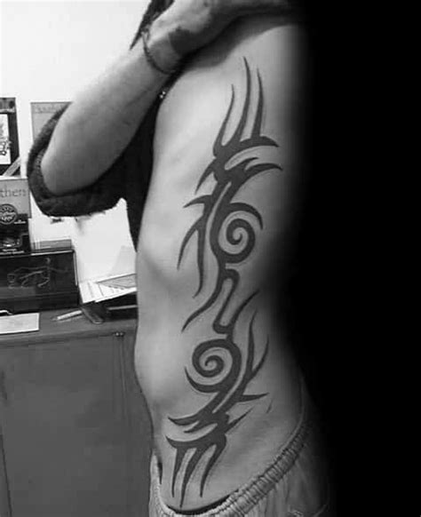 Popular rib tattoo designs for guys and girls. Top 40 Best Tribal Rib Tattoos For Men - Manly Ink Design ...