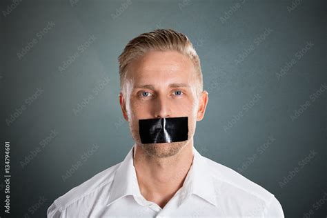 Man With Black Duct Tape Over His Mouth Stock Photo Adobe Stock