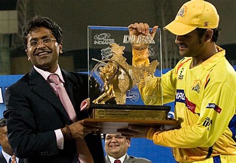 Lalit Modi Presents The Ipl Trophy To Ms Dhoni