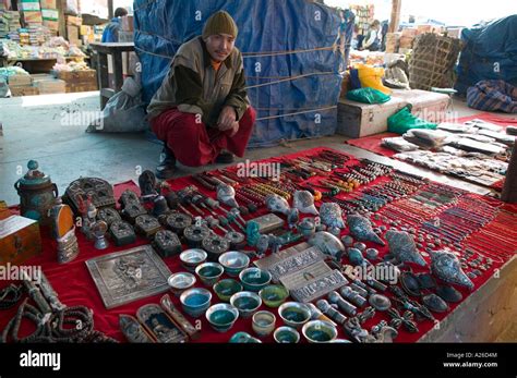A Man Sells Souvenirs At The Weekend Market In Thimpu Bhutan Stock