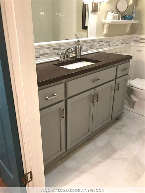 Note, the painting process i used here is almost exactly the same process i am sharing for how to paint laminate kitchen cabinets! New Hallway Bathroom Vanity Paint Color | Bathroom ...