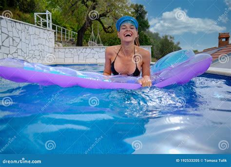 Woman Coming Out Of Pool Seductive Model In Swimsuit With Blonde Hair