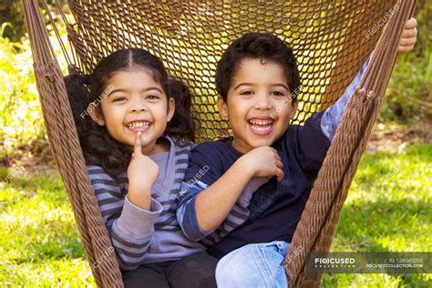 Twin Brother And Sister — Hammock Female Stock Photo 138045050