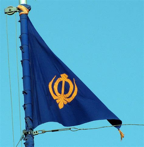 This Sikh Flag Called The Nishan Sahib Is A Another Triangular Flag