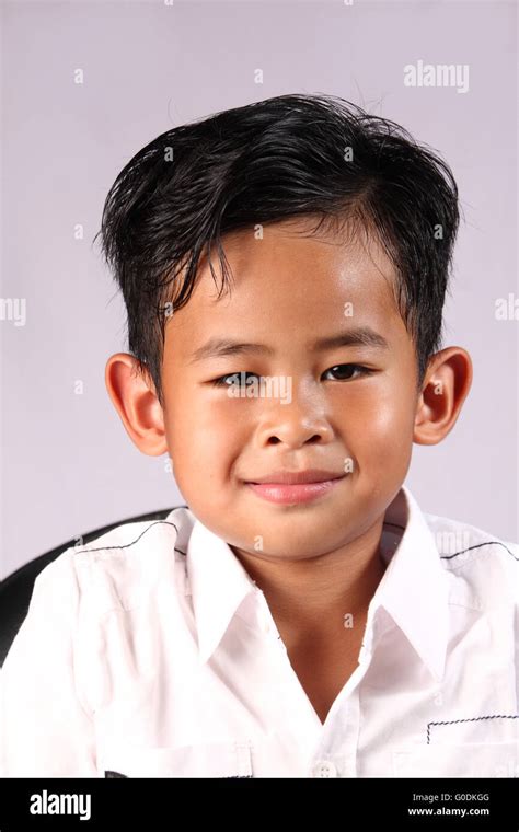 Portrait Of Happy And Smiling Asian Boy Stock Photo Alamy