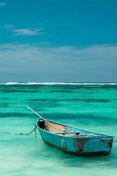 Pin By Marianne On Tourquoise Sea On A Blue Blue Day Ocean Boat Beach