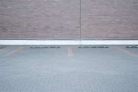 Outdoor Empty Space Car Parking And Modern Brick Wall Stock Photo