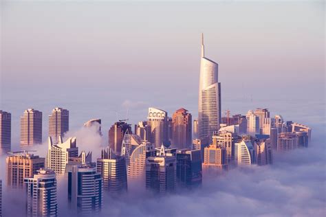 Dubai United Arab Emirates Skyscraper Building Sky Clouds Mist
