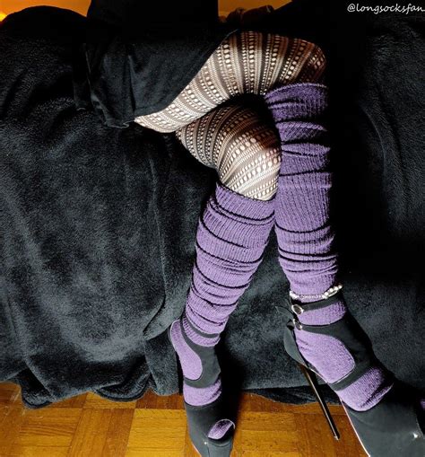 Fishnets High Heels And Purple Thigh High Socks Scrunched To Knee