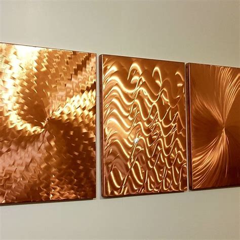 hand made copper wall art size 36 w x11 h x 0 5 d overall the swirling designs are hand