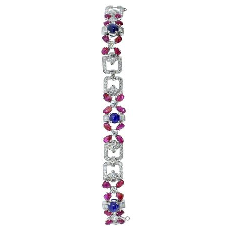 Carved Ruby Sapphire And Diamond Tutti Frutti Strap Bracelet For Sale