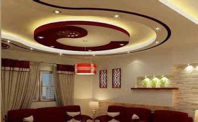 In the centre of the ceiling, a recession is created to hold the two small fans, which almost seem to blend. Latest POP false ceiling designs for living room hall ...