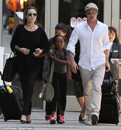 Angelina Jolie And Brad Pitt Are Accompanied By Zahara And Maddox As They Return To La After