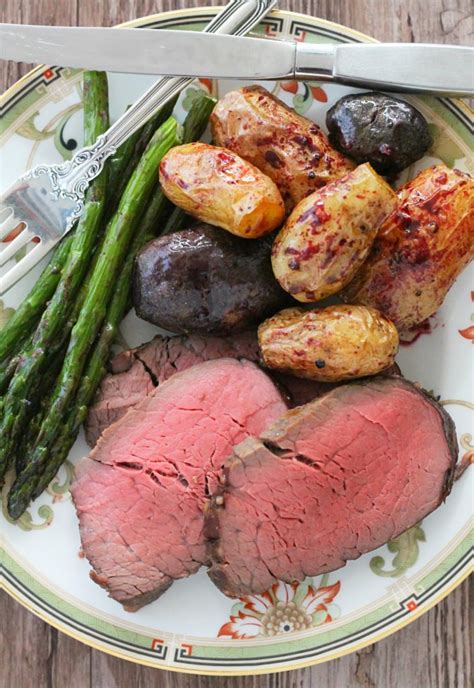 Preheat the oven to 225 degrees f. Slow Roasted Beef Tenderloin - with red wine pan sauce ...