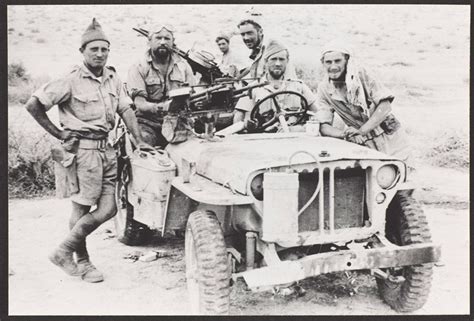 Members Of The Long Range Desert Group With A Jeep Armed With Twin