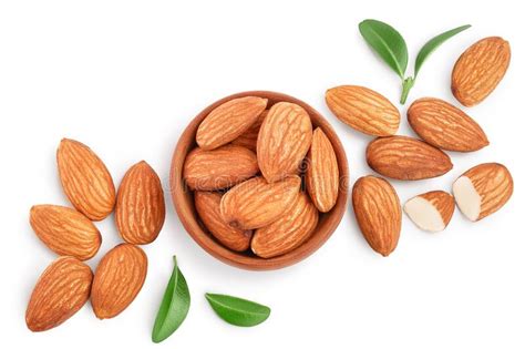 Almonds Nuts With Leaves In Wooden Bowl Isolated On White Background