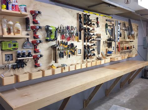 Tool Rack And Floating Workbench For A High School Woodshop Garage