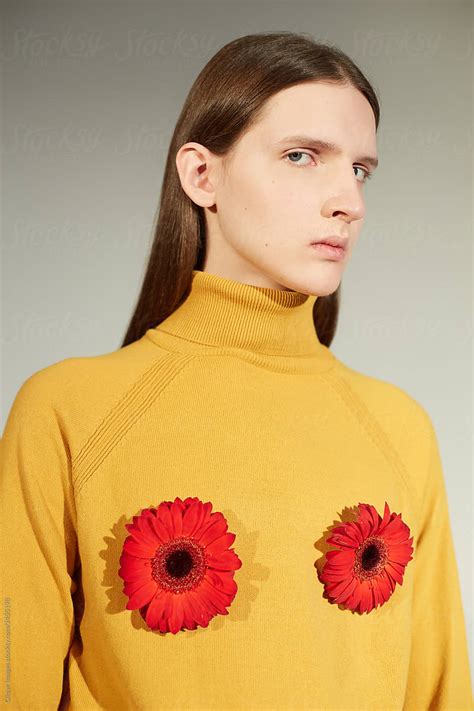 Gender Neutral Model With Flowers On Chest By Clique Images
