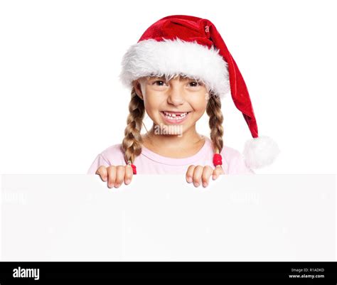Happy Little Girl In Santa Hat Stock Photo Alamy
