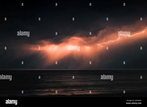 Lightning Storm Over The Ocean Stock Photo Alamy