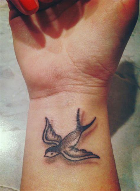 Wrist Tattoo Of A Cute Bird Cool Tattoos Online