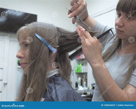Beautiful Lady Doing Hair In The Salonhairdresser Doing Haircut In