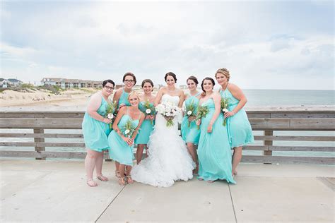 Bridesmaids In Blue Jennettes Pier Wedding Outer Banks Wedding Photo By Natalie Heim