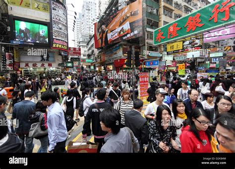 Hong Kong China Crowd In Mong Kok District On A Crossing Stock Photo