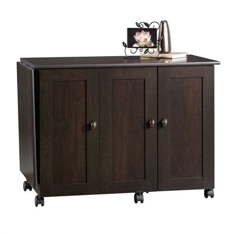 There are many types of sewing machine tables on the market. Craft and Mobile Sewing Cart in Cinnamon Cherry - 411615