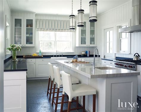 White quartzite can be referred to as a type of natural stone with attractive streaks of colours these primary properties of quartzite kitchen worktops underline why quartzite cost is a tad higher than. Contemporary White Kitchen with Quartzite Countertops ...