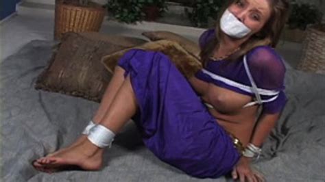 Trussedup And Tapegagged In Her Harem Costume Enticing Carli Banks
