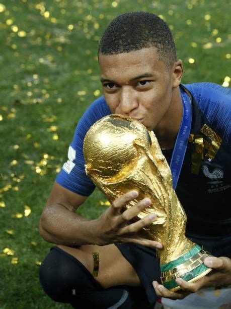 Fifa 18 world cup kylian mbappe 94 rated in game stats, player review and comments on futwiz. Kylian Mbappe of France kisses the world cup trophy FIFA ...