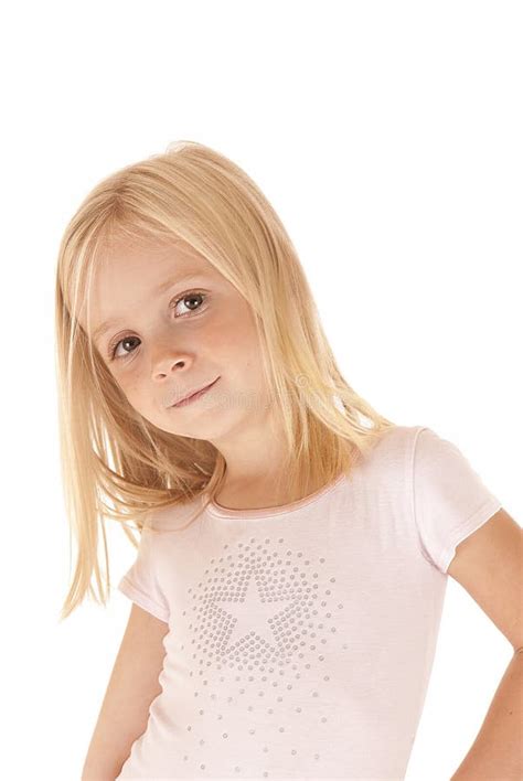 Innocenct Blond Preschool Girl Smiling Looking At Camera Stock Image