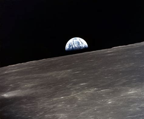 Apollo 10 Earthrise 1969 Na View Of The Earth Rising Over The Moons