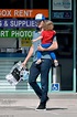 Ashton Kutcher is every bit the doting dad as he carries son Dimitri ...