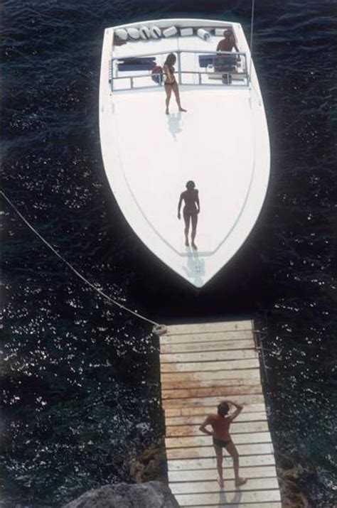 Slim Aarons Speedboat Landing 1973 Porto Ercole Italy At 1stdibs