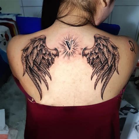Angel Wing Tattoo Design Ideas For Females Popxo