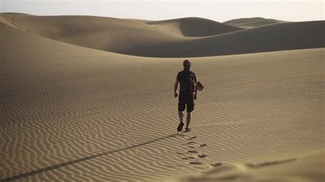 Man Walking In Desert Stock Video Motion Array