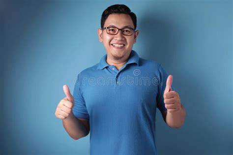 Young Man Showing Thumbs Up Gesture Ok Sign Stock Image Image Of