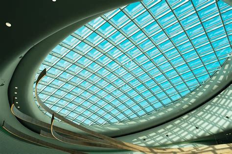 Futuristic Abstract Glass Roof Of The Building Blue Sky Stock Photo