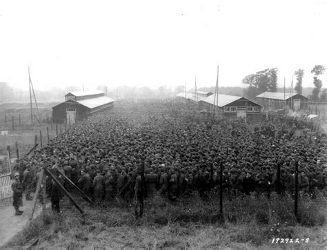 German Prisoners Of War Packed Into The Nonant Le Pin Prisoner Camp 1944