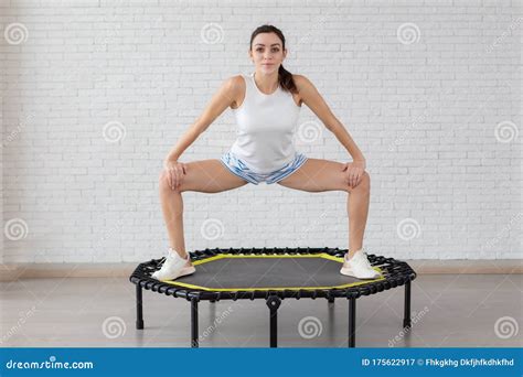 relaxed woman jumping on trampoline stock image image of background gymnastics 175622917