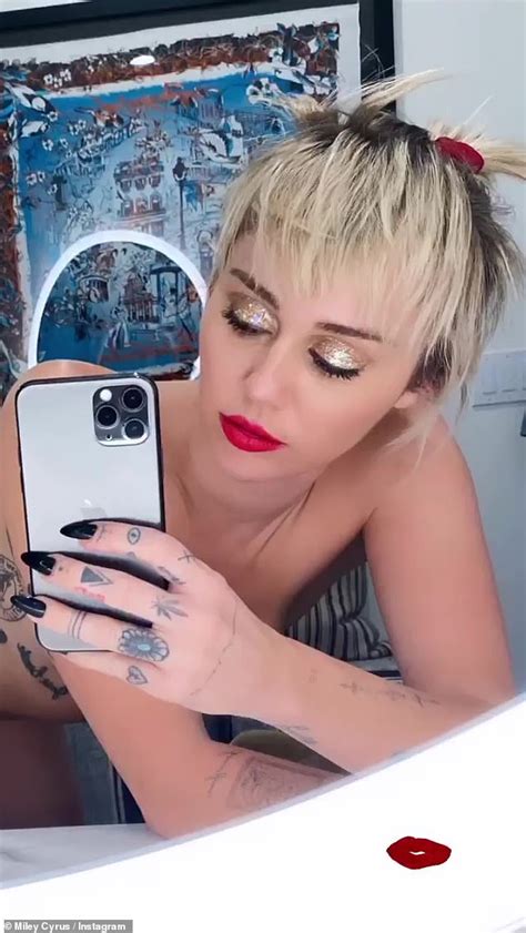 Miley Cyrus Strips Down For A Series Of Nude Mirror Selfies As She