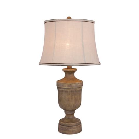 From the seaside to the suburbs, this table lamp is sure to welcome in a touch of coastal charm, wherever you call home. Fangio Lighting 30 in. Wood Resin Table Lamp-6204 - The ...