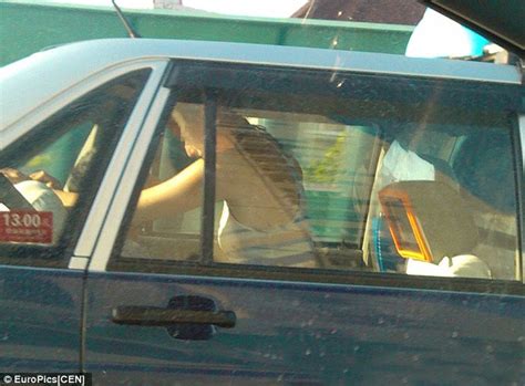 chinese couple caught having sex in the back of moving taxi in broad daylight daily mail online