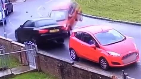Watch As Speeding Toyota Driver Loses Control And Flies Around Bend Before Smashing Into Parked